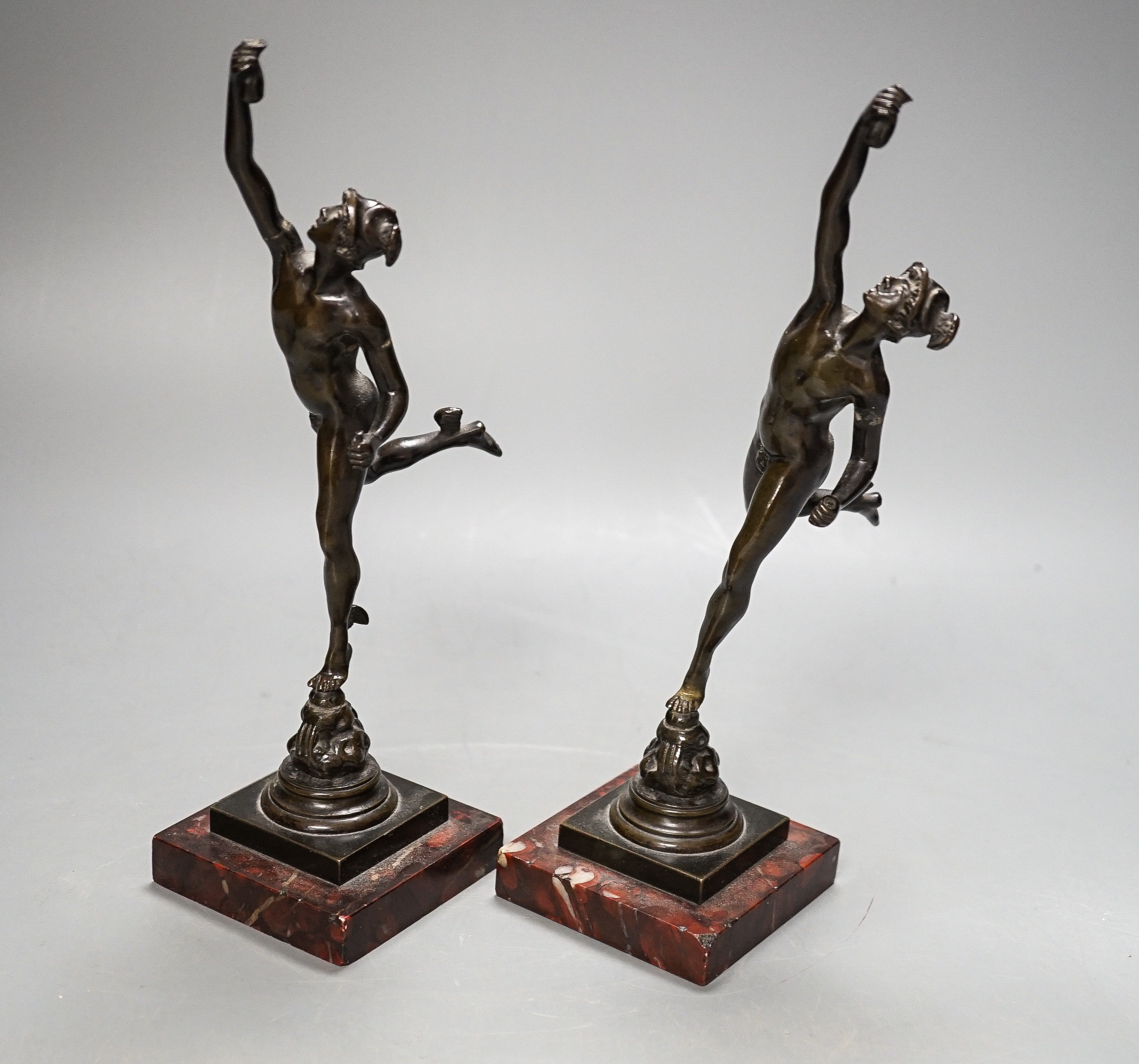 Two 19th century Grand Tour souvenir bronze figures of Mercury, 23 cms high.